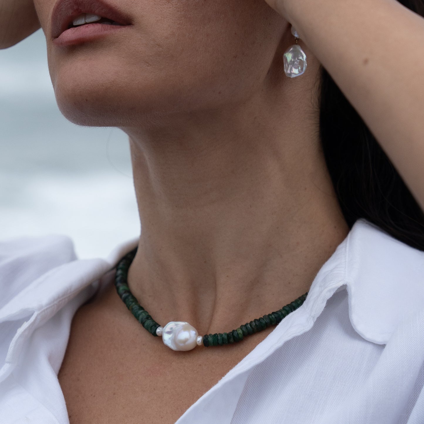 WAKAME necklace from After-Sun Hours, soft green beaded strand with pearls.