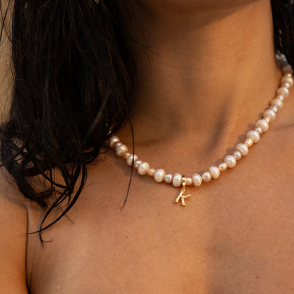 CABANA INITIALS charm from After-Sun Hours, gold-plated bamboo letter charm on a removable clasp.