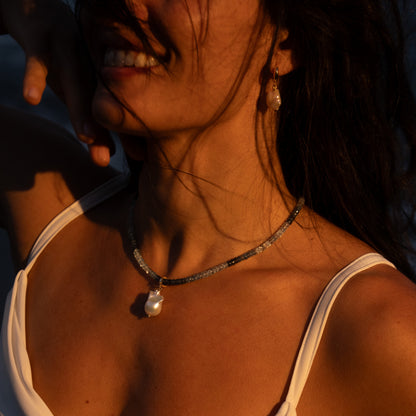NALU charm from After-Sun Hours, a single baroque pearl on a removable clasp.