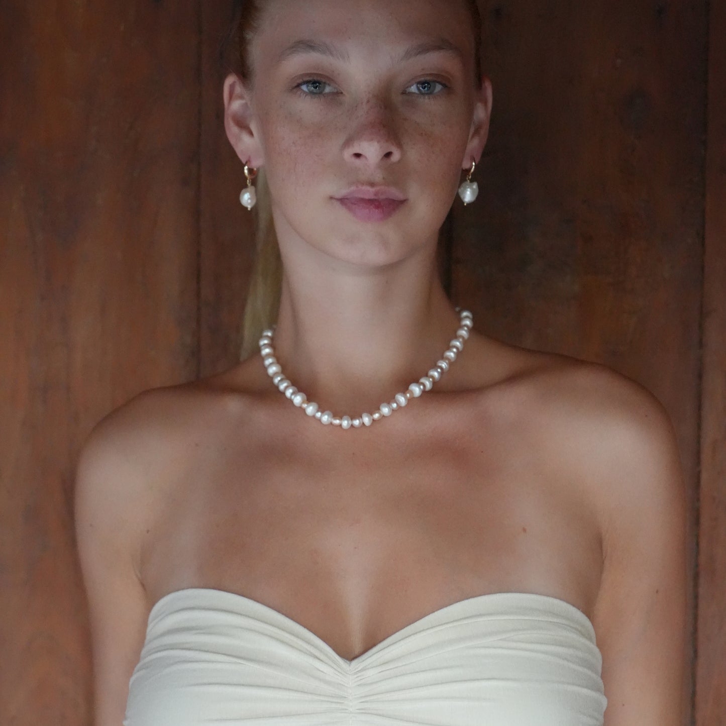 MABE necklace from After-Sun Hours, a strand of peach and pink pearls.