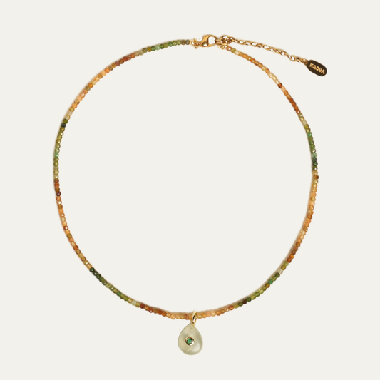 NONI necklace from After-Sun Hours, beads shading from green to gold with a soft green pendant.