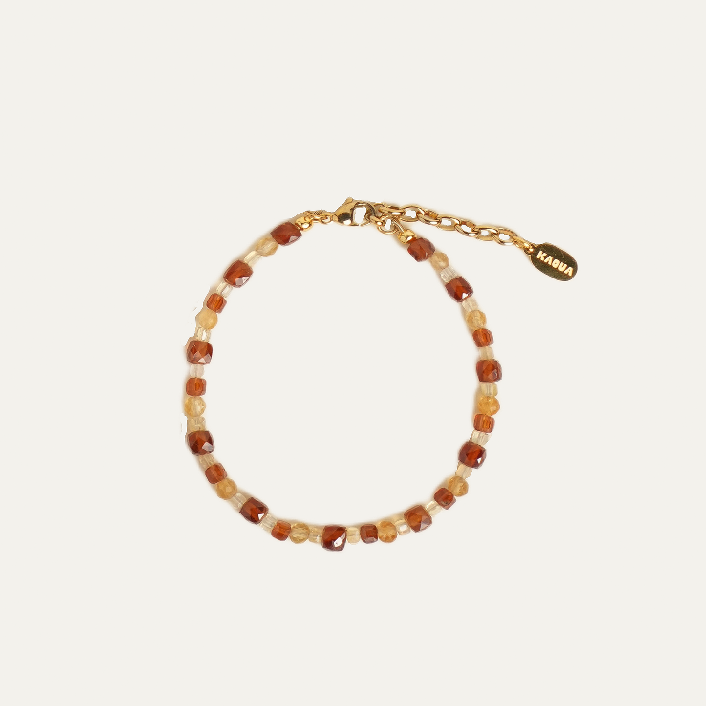 SUNA bracelet from After-Sun Hours, warm orange and pale yellow beads.